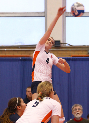 Andrea Fisher, SU sophomore outside hitter, returns a ball over the net on Sunday against Pittsburgh. Fisher went on to hit a serve out of bounds to give Pitt a 13-11 advantage in the second set, just one of many unforced errors made by the Orange on Sunday.