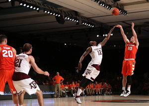 Trevor Cooney lofts a 3-pointer against Texas A&M in the Battle 4 Atlantis tournament championship.