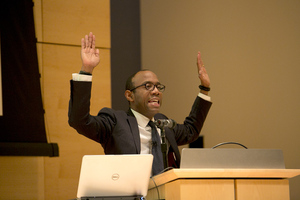 NAACP President Cornell Brooks speaks Wednesday evening inside the Joyce Hergenhan Auditorium .