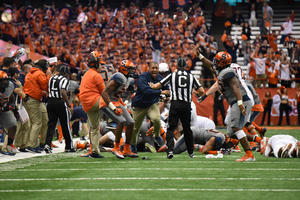 Syracuse's defense picks up a fumble after it gained a 31-17 lead on No. 17 Virginia Tech. The Orange's defense had one of its best games of the year. 