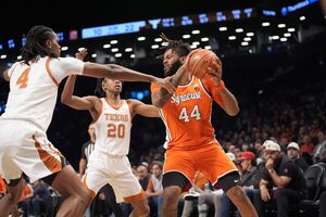 Syracuse rallied from a 16-point first-half deficit to take the lead with four minutes remaining, but Texas pulled away to hand the Orange their first loss of the season.