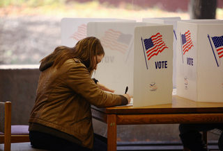 Laura Cohen, a sophomore magazine journalism major, votes in Bird Library Tuesday.