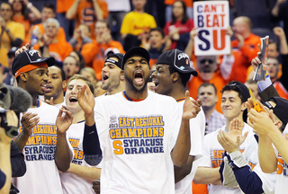 James Southerland #43 (C) of the Syracuse Orange celebrates after the win over the Marquette Golden Eagles.