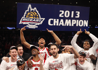 Louisville defeats Syracuse, becoming The Big East Tournament champions at Madison Square Garden. 