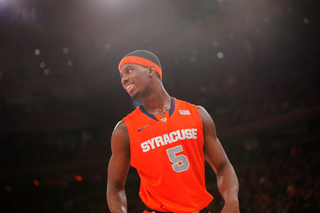 C.J. Fair grins as Syracuse once again takes the lead late in the second half. 