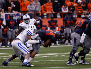 Adonis Ameen-Moore is brought down on a tackle. 