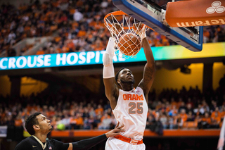 Christmas throws down a two-handed dunk for two of his 14 points in the opening frame.