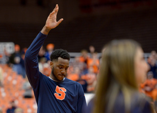 Rakeem Christmas waves to the Carrier Dome crowd as he is honored on senior night. 