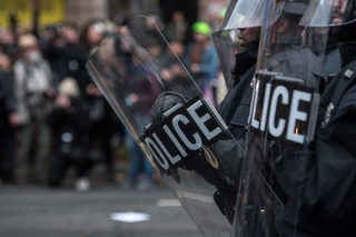 The police barricaded anti-Trump protesters at Franklin Square.