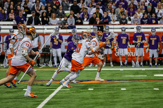 Andrew Helmer pushes the ball up the field.