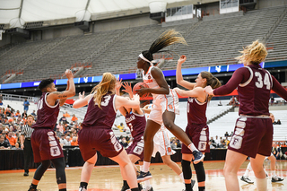 Djaldi-Tabdi is surrounded by all five Fordham defenders down low.