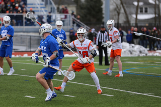 Jared Fernandez slides across a Duke ball-handler. 